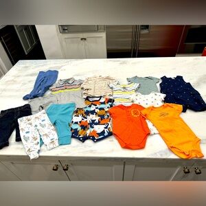 Bundle size 6 month clothing. 5 pants, 5 onesies, 1 longsleeve shirt, 3 rompers